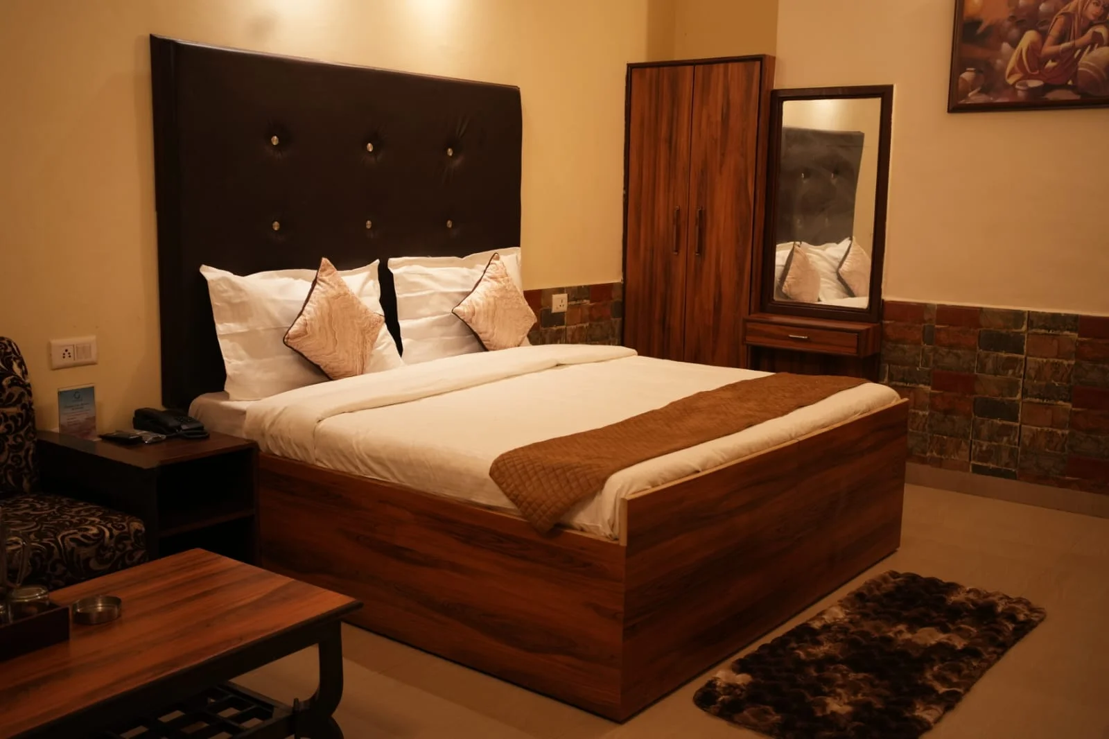Luxury hotel suite with green and gold interiors at an Aspien Hotels Group property